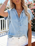Light blue denim shirt for women, featuring a classic button-up style and a relaxed fit. 0