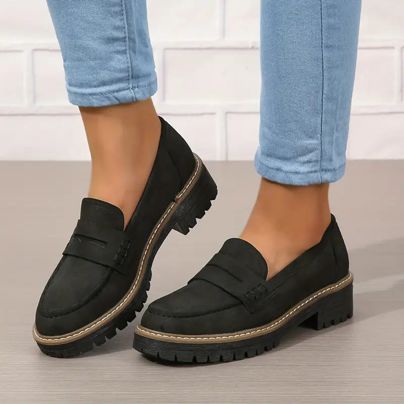 Soft blue moccasins with an ergonomic sole and wedge design, offering a casual and comfortable style. 0