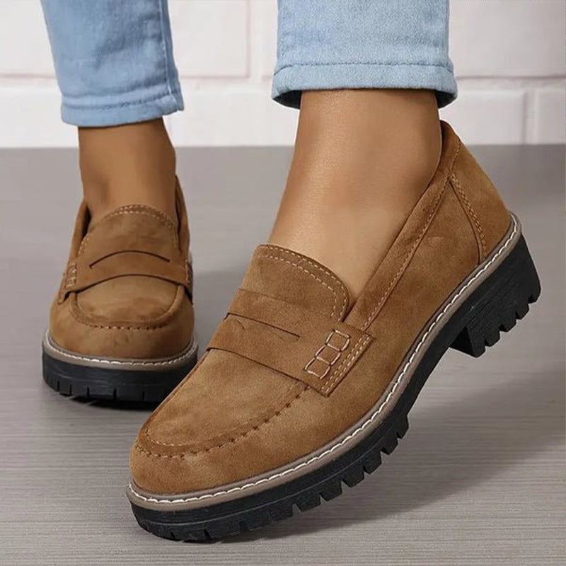 Soft blue moccasins with an ergonomic sole and wedge design, offering a casual and comfortable style. 5