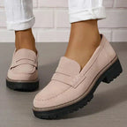 Soft blue moccasins with an ergonomic sole and wedge design, offering a casual and comfortable style. 7