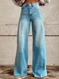 High-waisted, loose-fit wide leg pants in a soft beige, offering a relaxed and effortless look. 0
