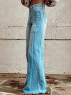 High-waisted, loose-fit wide leg pants in a soft beige, offering a relaxed and effortless look. 2