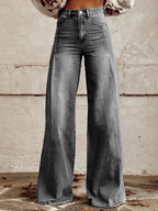 High-waisted, loose-fit wide leg pants in a soft beige, offering a relaxed and effortless look. 3