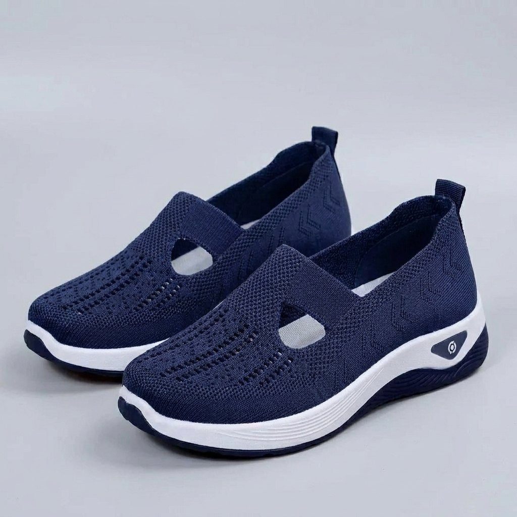 Light grey breathable mesh slip-on shoes with a casual orthopedic style for women. 2
