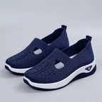 Light grey breathable mesh slip-on shoes with a casual orthopedic style for women. 2