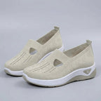Light grey breathable mesh slip-on shoes with a casual orthopedic style for women. 6