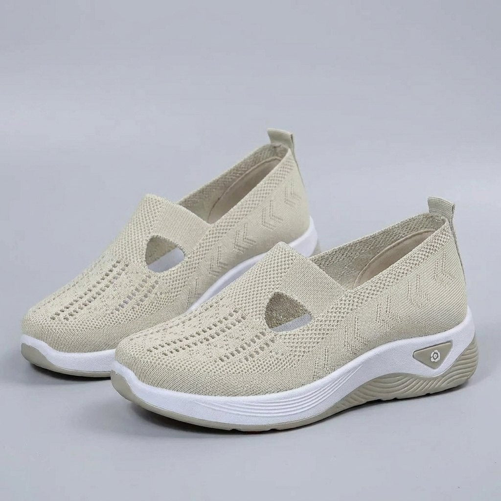 Light grey breathable mesh slip-on shoes with a casual orthopedic style for women. 6