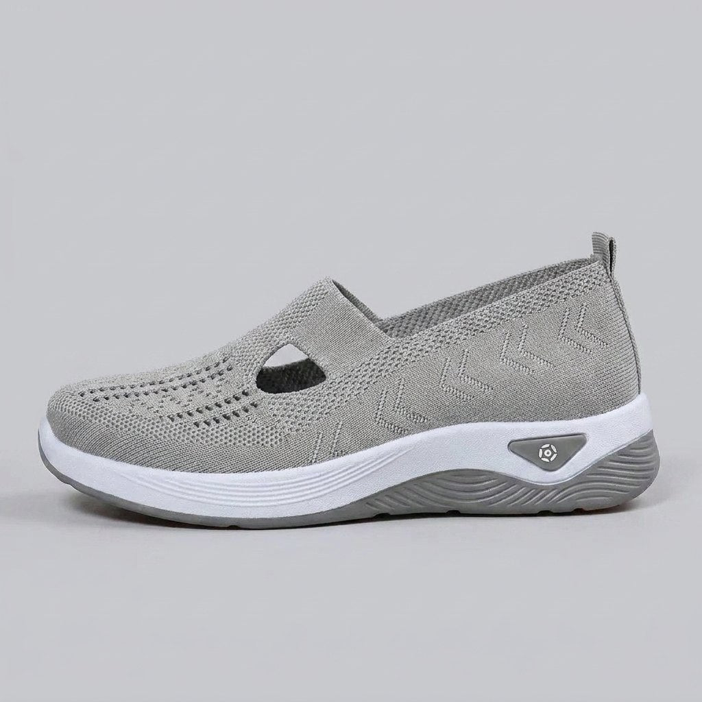 Light grey breathable mesh slip-on shoes with a casual orthopedic style for women. 8