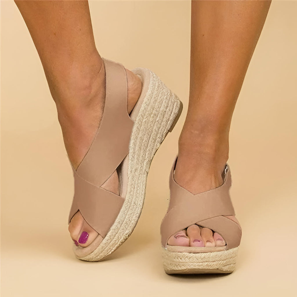 Cleo Comfort Sandals in soft beige, featuring a minimalist design with adjustable straps and a cushioned footbed. 0
