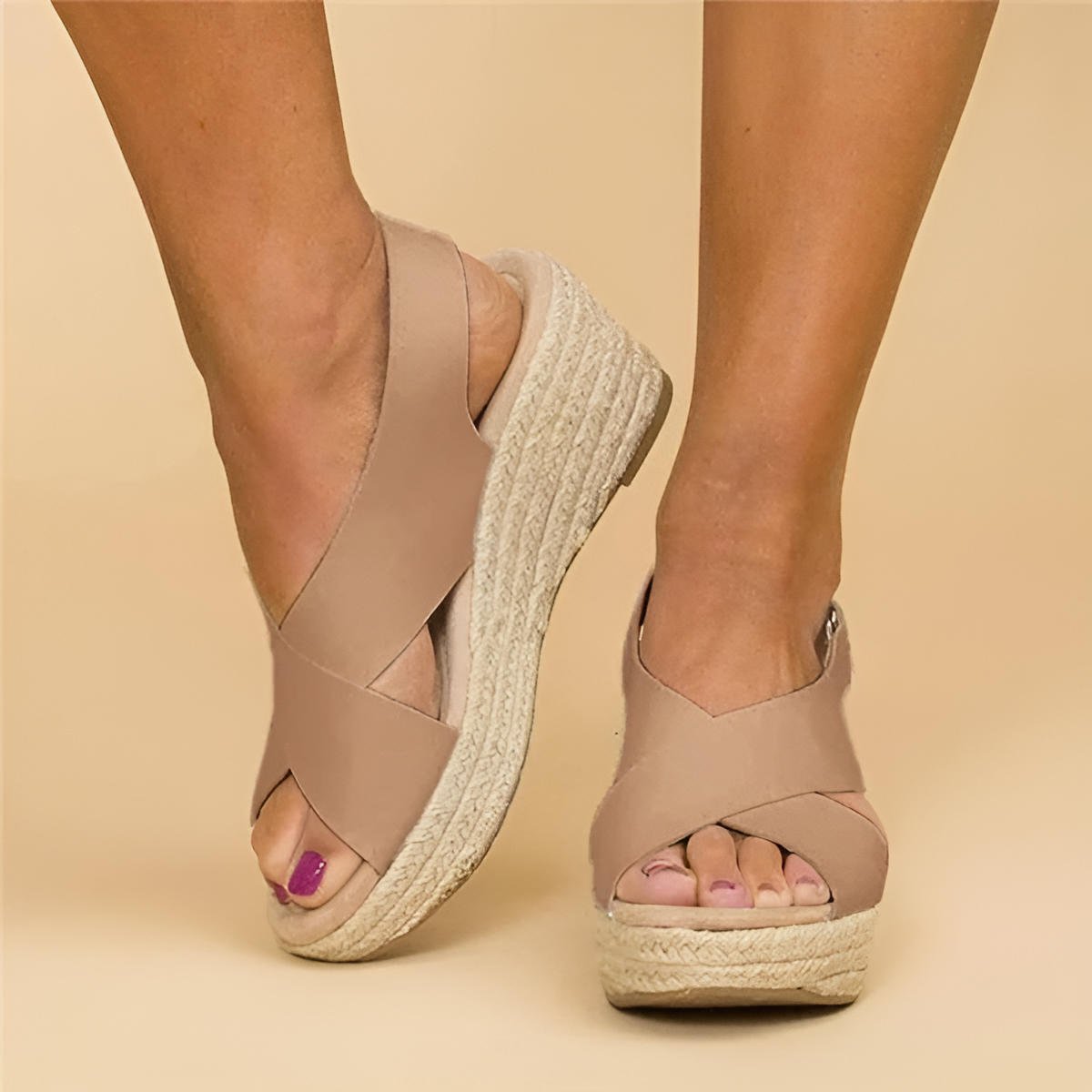 Soft leather women's sandals in tan with adjustable cross straps for a comfortable, casual look. 0