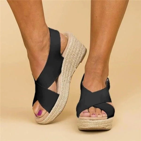 Soft leather women's sandals in tan with adjustable cross straps for a comfortable, casual look. 4