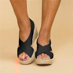 Soft leather women's sandals in tan with adjustable cross straps for a comfortable, casual look. 6