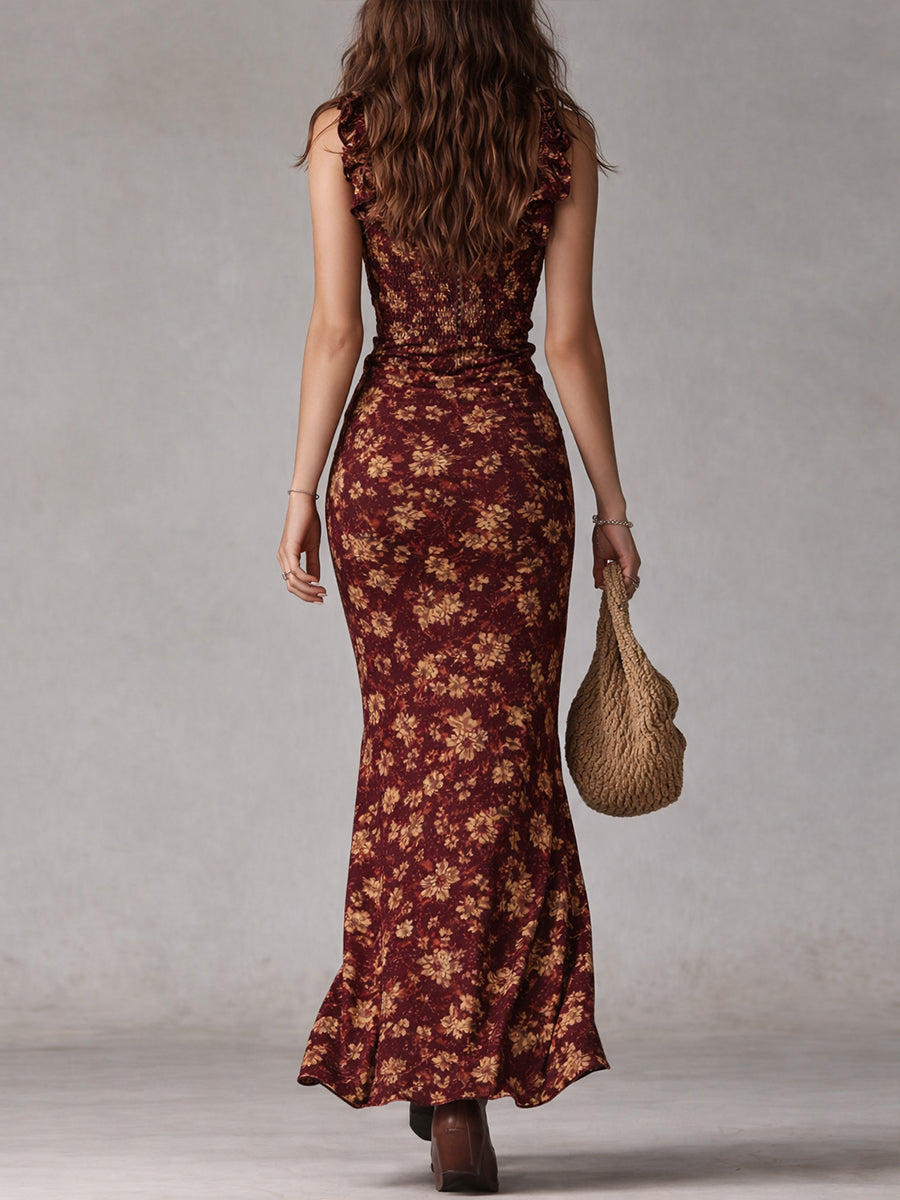 Floral maxi dress in soft pastel colors with a flowing silhouette and delicate ruffle details. 5