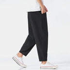 Light beige cropped pants in a relaxed fit, made from a soft cotton-linen blend, featuring a drawstring waist. 3