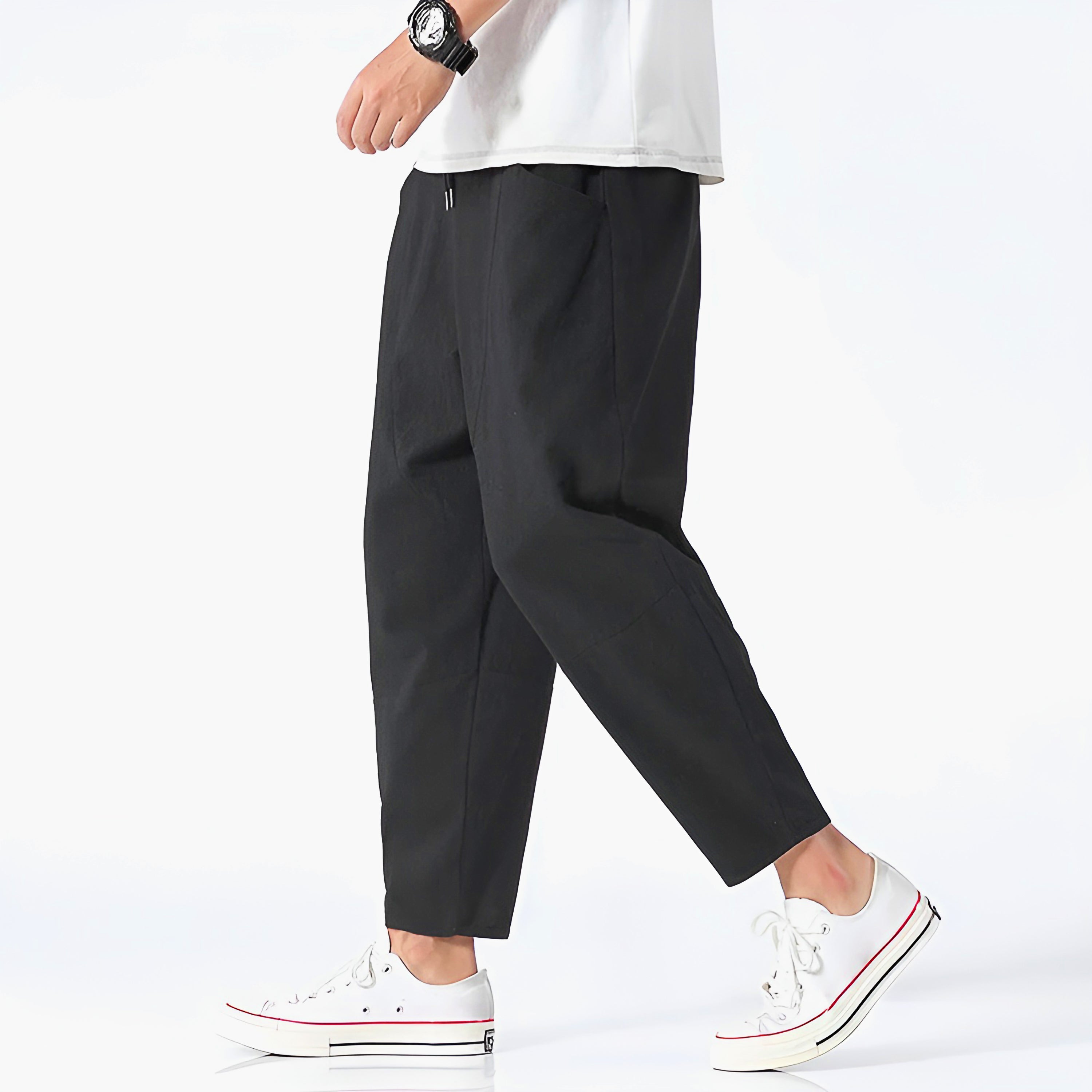 Light beige cropped pants in a relaxed fit, made from a soft cotton-linen blend, featuring a drawstring waist. 4