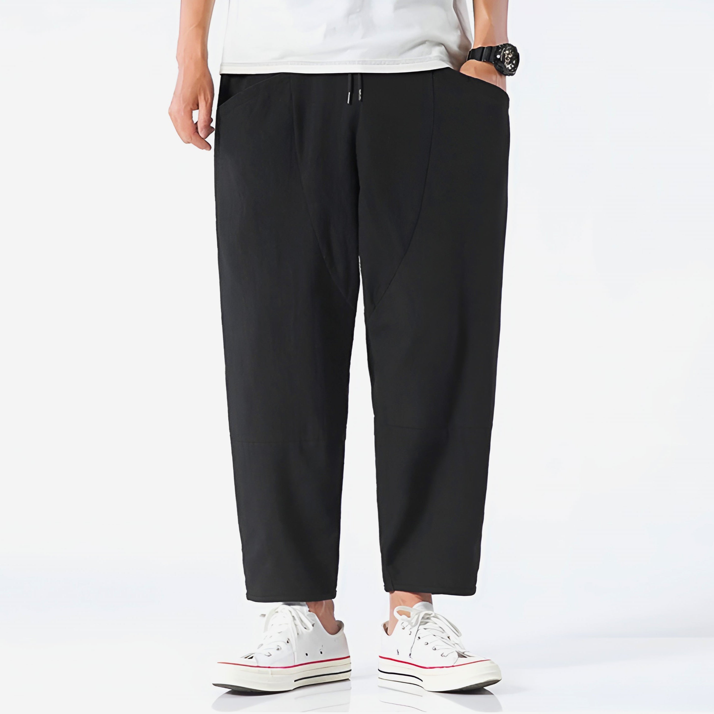 Light beige cropped pants in a relaxed fit, made from a soft cotton-linen blend, featuring a drawstring waist. 5