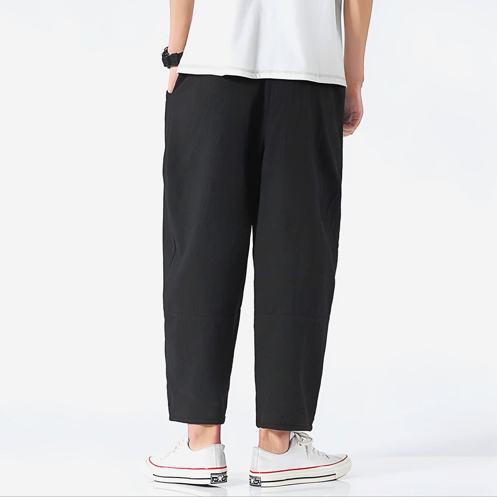 Light beige cropped pants in a relaxed fit, made from a soft cotton-linen blend, featuring a drawstring waist. 6