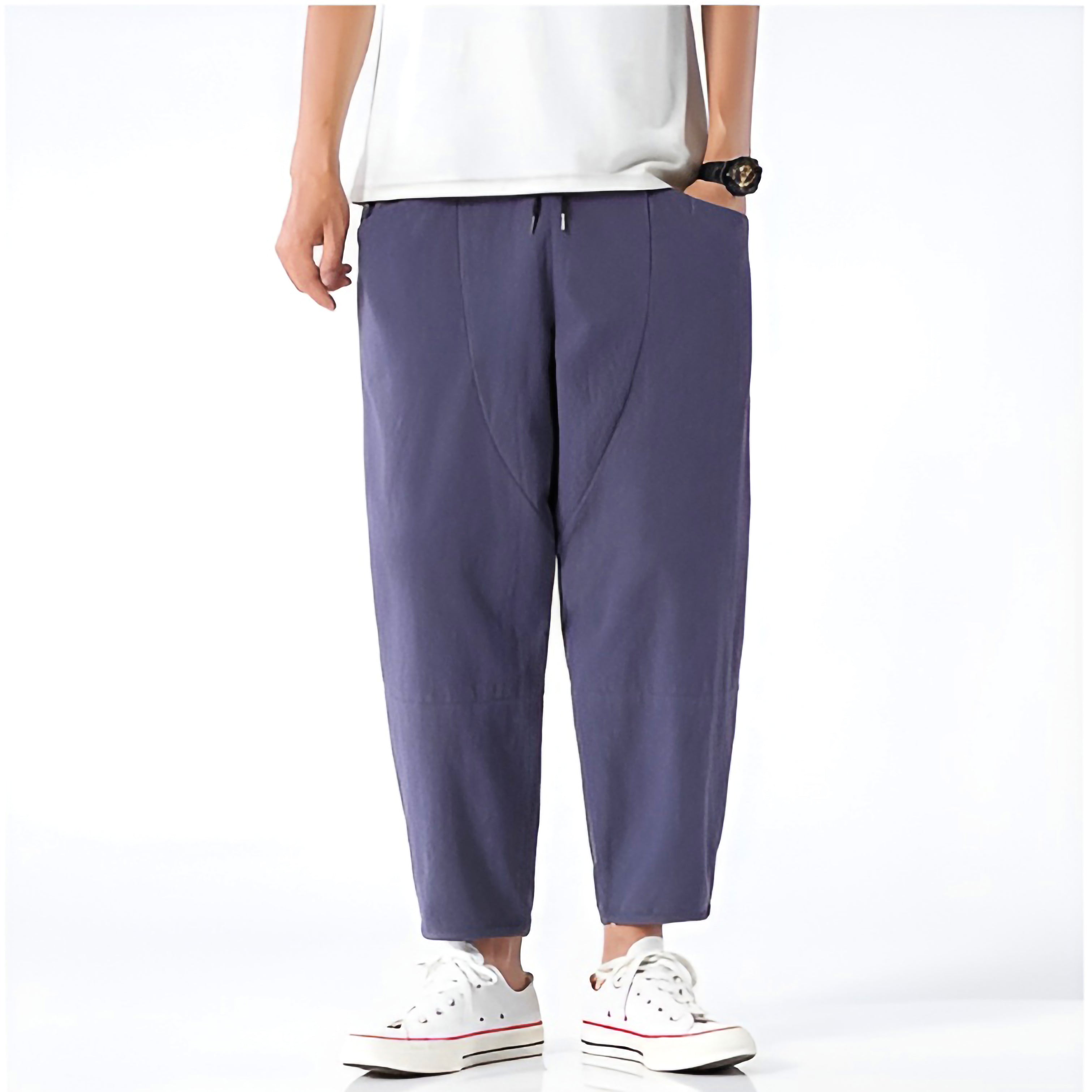 Light beige cropped pants in a relaxed fit, made from a soft cotton-linen blend, featuring a drawstring waist. 8