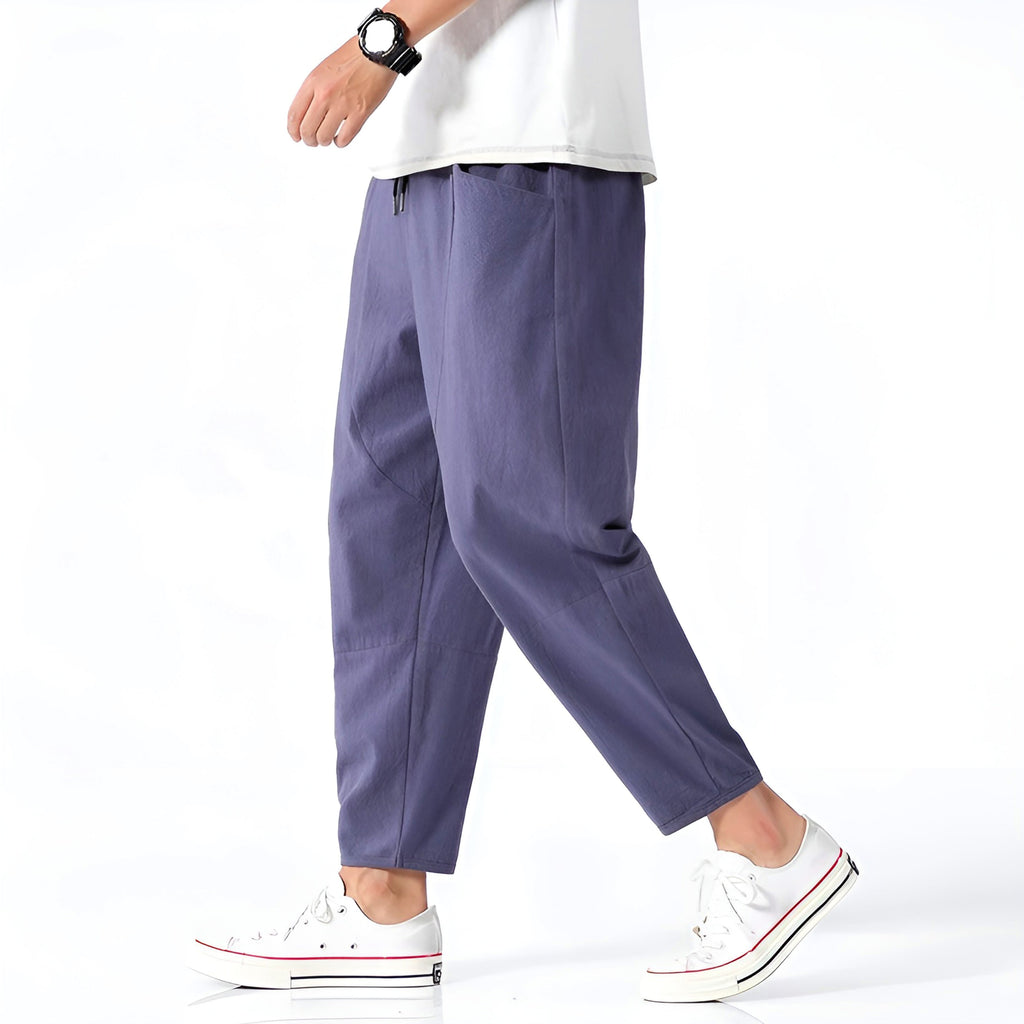 Light beige cropped pants in a relaxed fit, made from a soft cotton-linen blend, featuring a drawstring waist. 9