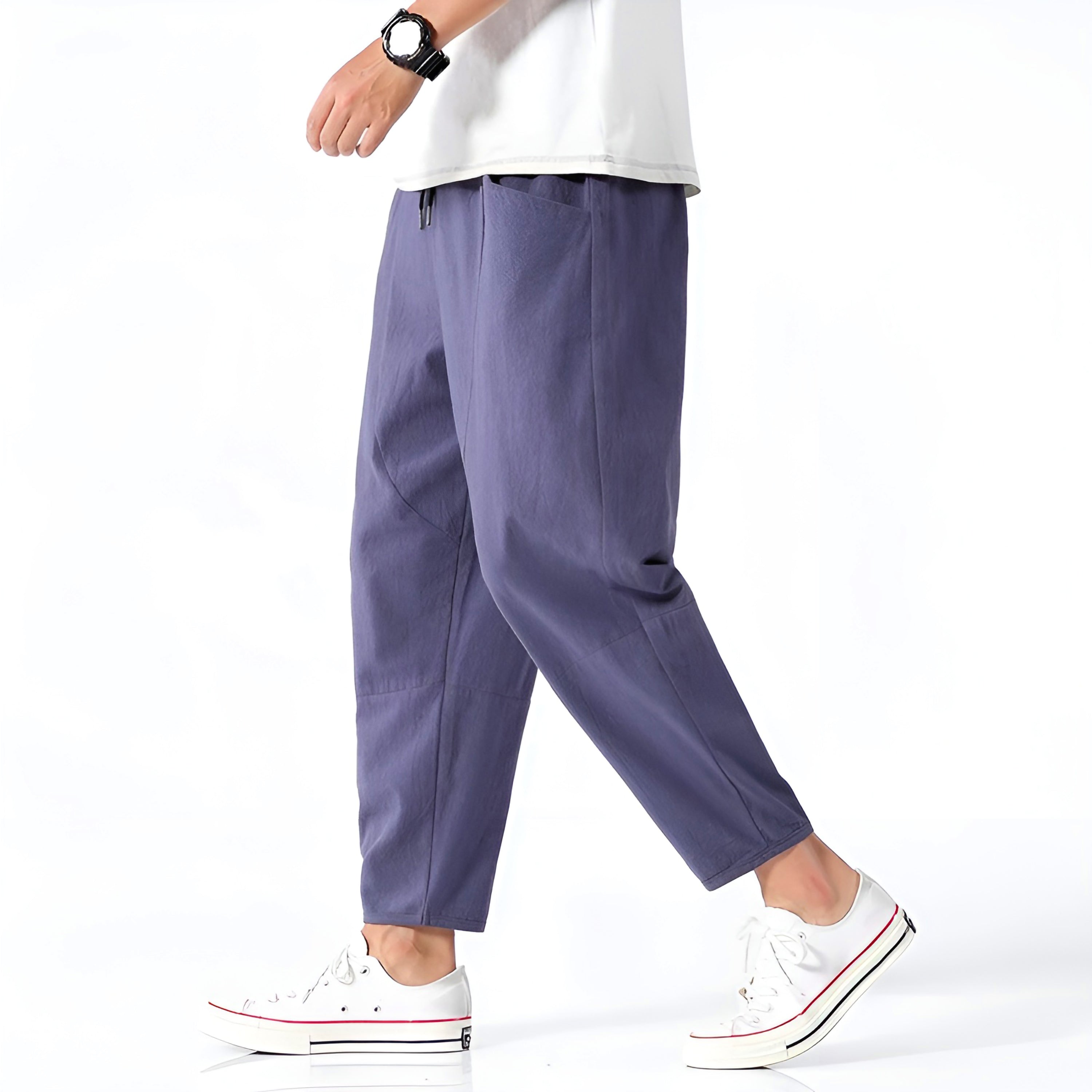 Light beige cropped pants in a relaxed fit, made from a soft cotton-linen blend, featuring a drawstring waist. 9