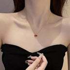 Ciliegia Cherry Pendant Necklace – styled view