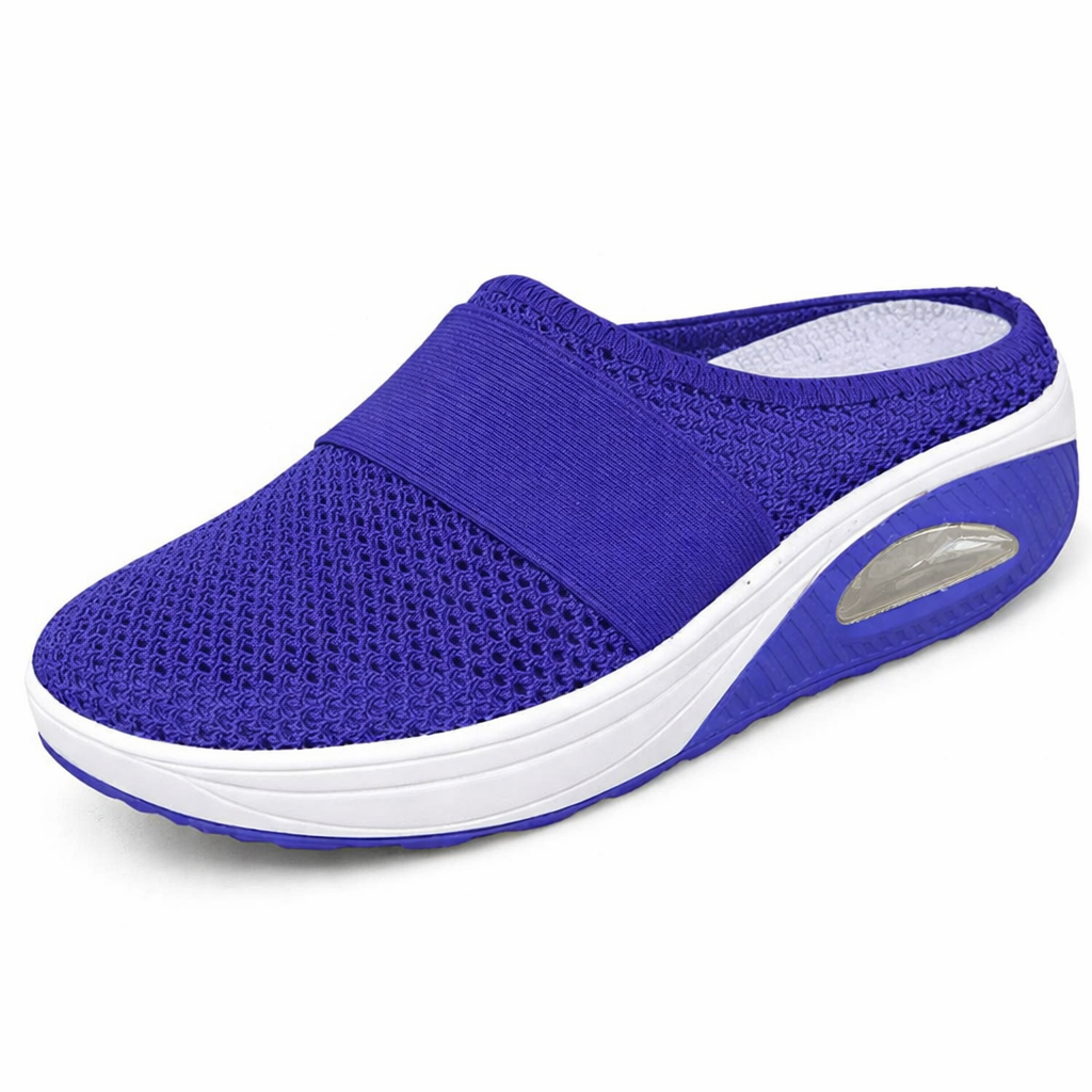 Light grey slip-on mules with a breathable upper and cushioned sole for casual comfort. 7