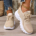 Light gray orthopedic sneakers with a roomy toe box and cushioned sole, featuring a casual and comfortable style. 0