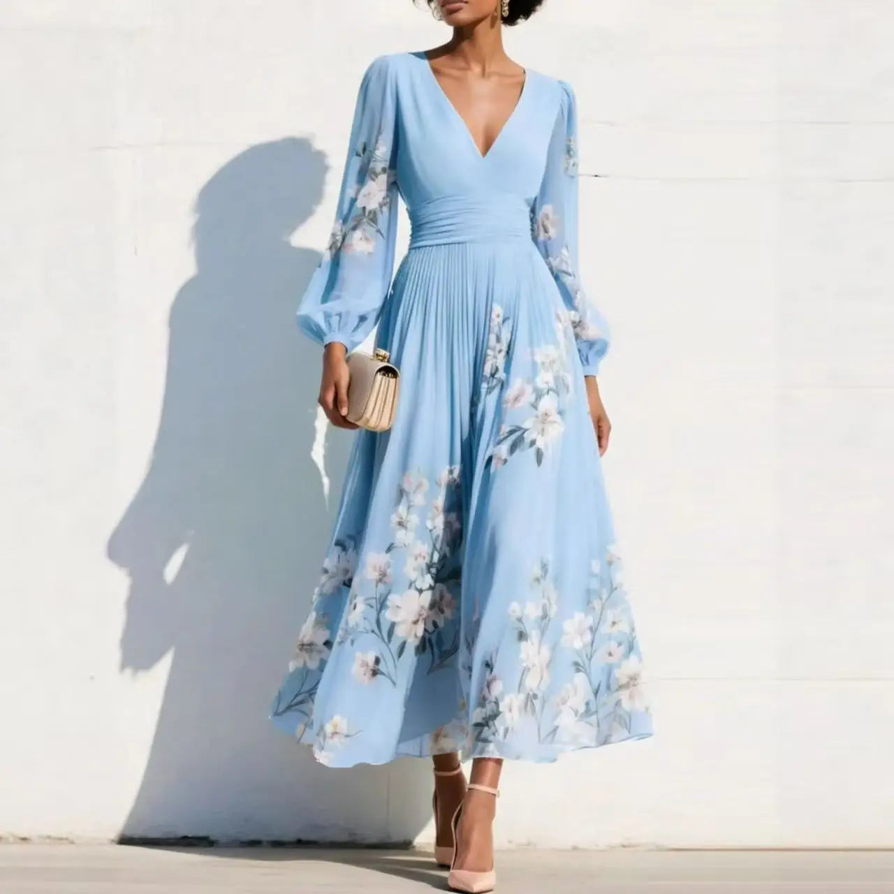 Ella floral midi dress in soft pink, featuring a V neckline and a flowing, feminine silhouette. 2