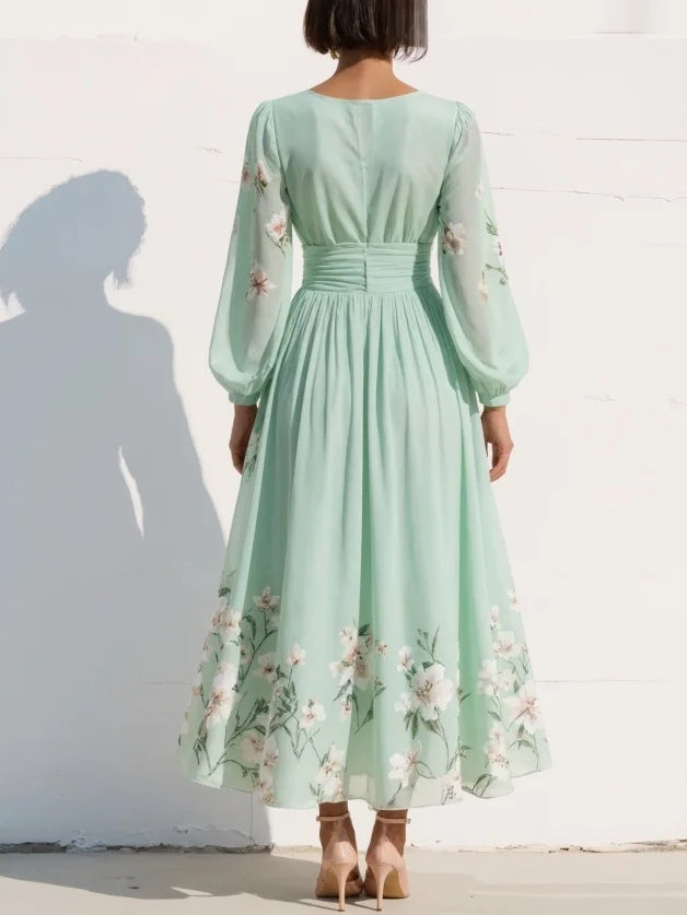 Ella floral midi dress in soft pink, featuring a V neckline and a flowing, feminine silhouette. 3