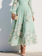 Ella floral midi dress in soft pink, featuring a V neckline and a flowing, feminine silhouette. 6