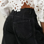 Light blue wide-leg jeans with a relaxed fit, featuring a classic five-pocket style and frayed hem. 8