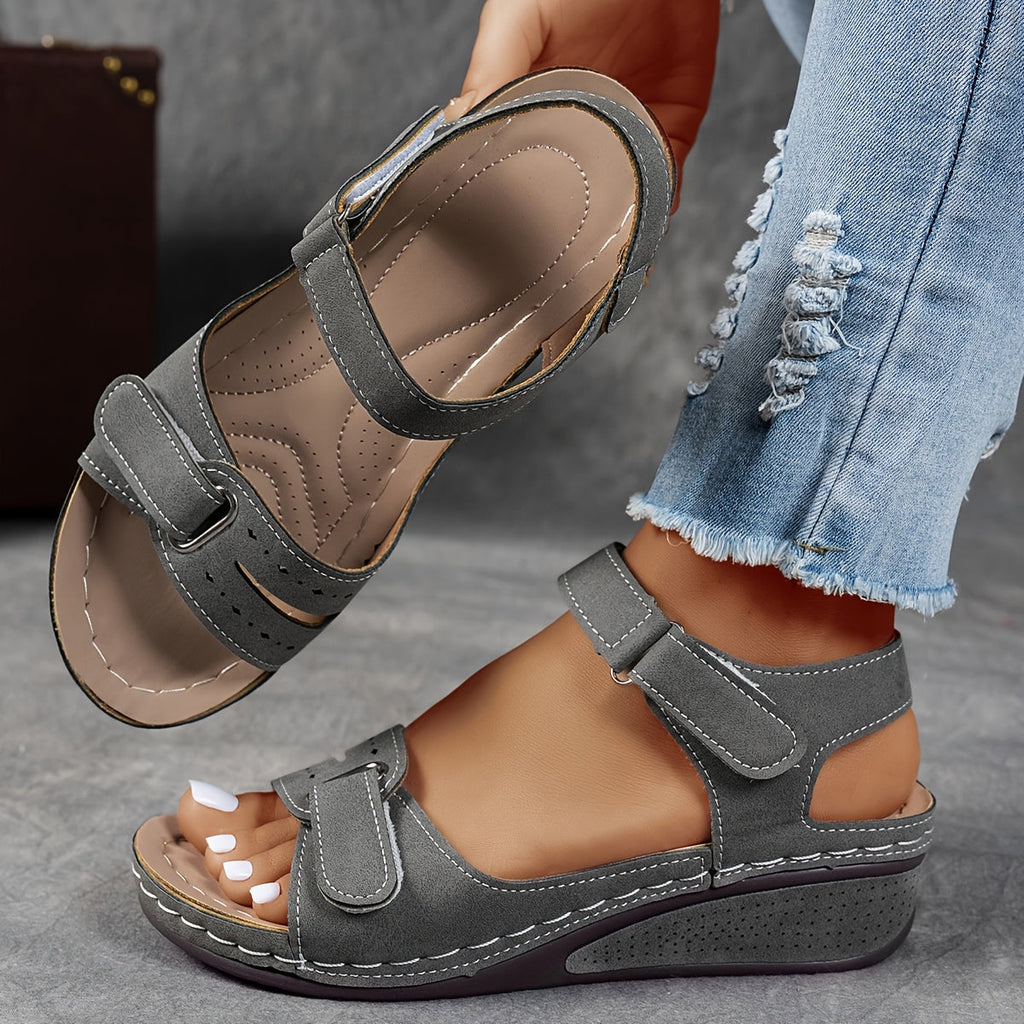 Light blue orthopedic sandals with adjustable straps, featuring a casual and comfortable style. 0