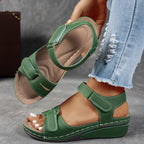 Light blue orthopedic sandals with adjustable straps, featuring a casual and comfortable style. 2