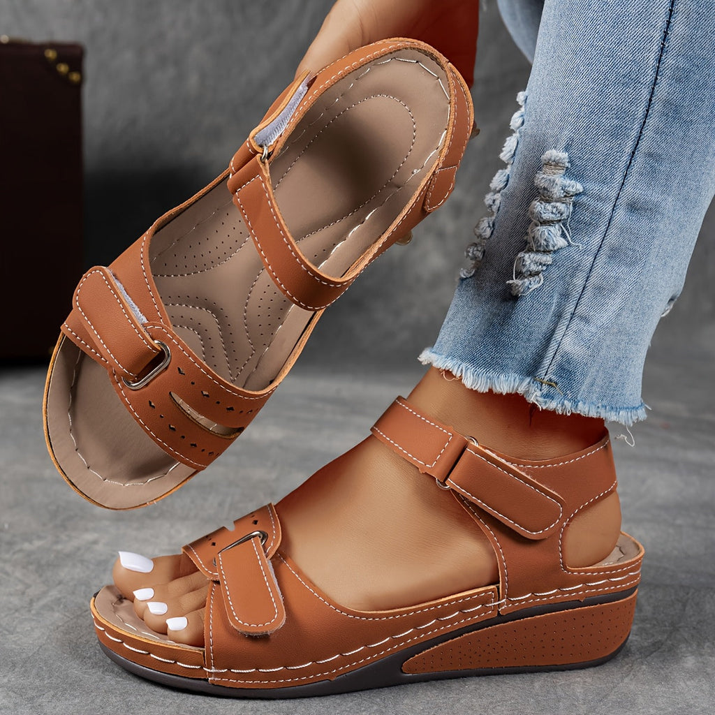 Light blue orthopedic sandals with adjustable straps, featuring a casual and comfortable style. 4
