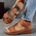 Light blue orthopedic sandals with adjustable straps, featuring a casual and comfortable style. 4