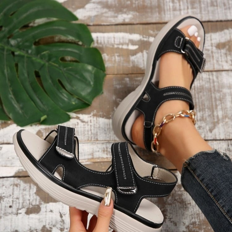Black orthopedic support sandals with a cushioned sole, featuring a casual and comfortable design for everyday wear. 4