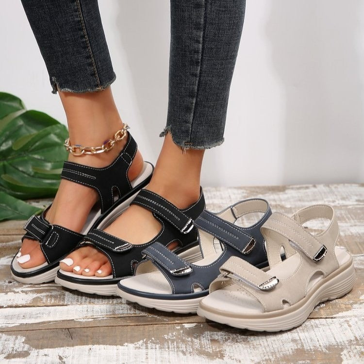 Black orthopedic support sandals with a cushioned sole, featuring a casual and comfortable design for everyday wear. 7