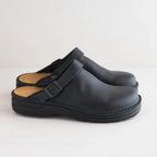 Comfortable orthopedic shoes in navy blue with a cushioned sole and breathable mesh design. 2