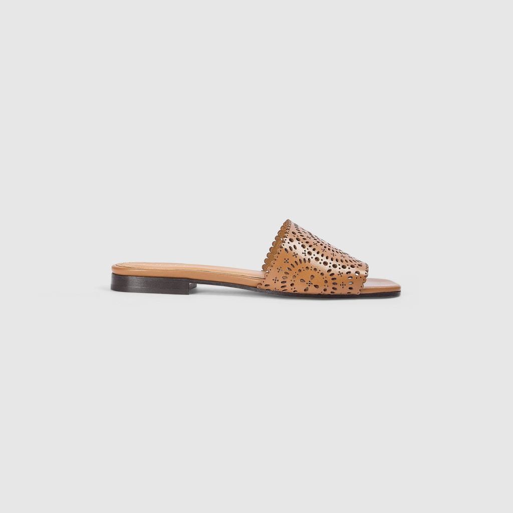 Tan leather sandals with a soft square toe and intricate laser-cut pattern. 2