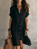 Black linen midi dress with a relaxed fit and minimalist style. 0