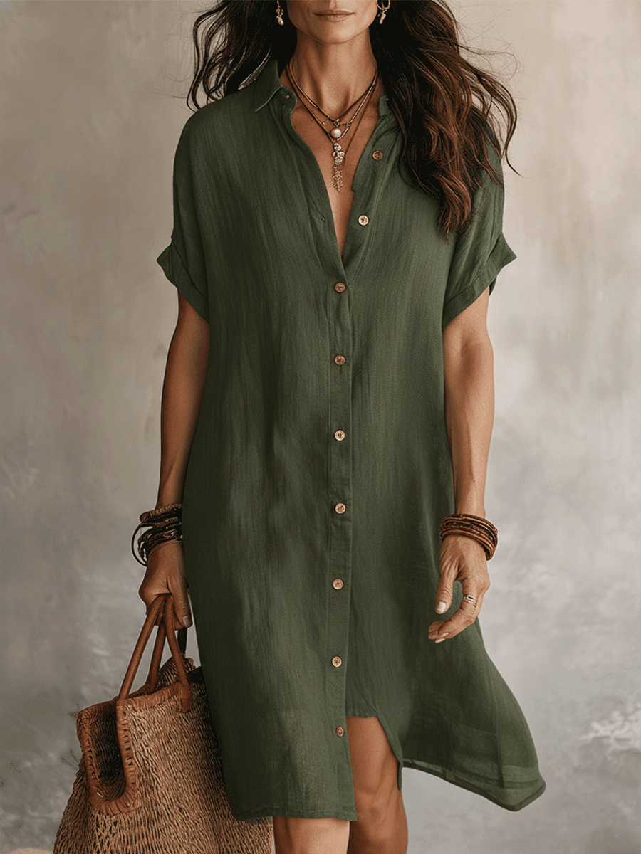 Black linen midi dress with a relaxed fit and minimalist style. 4