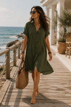 Black linen midi dress with a relaxed fit and minimalist style. 5