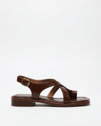 Brown leather cross sandals with a casual style, featuring a simple yet elegant design for everyday wear. 0