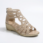 Comfortable orthopedic sandals in a soft beige color with a stylish, modern design. 2
