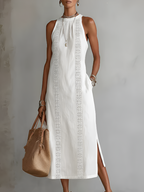 Light blue linen summer dress with a relaxed fit and adjustable straps, perfect for warm weather. 0