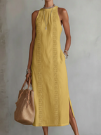 Light blue linen summer dress with a relaxed fit and adjustable straps, perfect for warm weather. 4