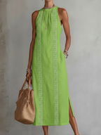Light blue linen summer dress with a relaxed fit and adjustable straps, perfect for warm weather. 5