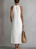 Light blue linen summer dress with a relaxed fit and adjustable straps, perfect for warm weather. 8