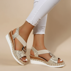 Brown Myla platform sandals for women, featuring a sleek design with braided straps and a chunky sole. 0