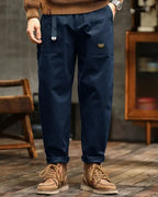 Relaxed fit vintage cargo pants in olive green cotton with flap pockets. 6